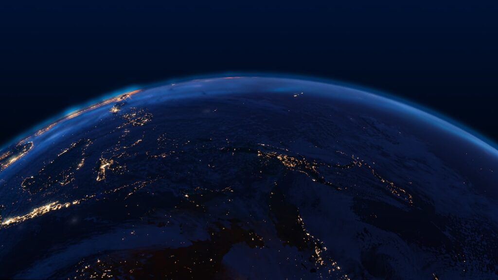 Rendu 3D de la planète Terre avec continents et océans visibles / 3D render of planet Earth with visible continents and oceans