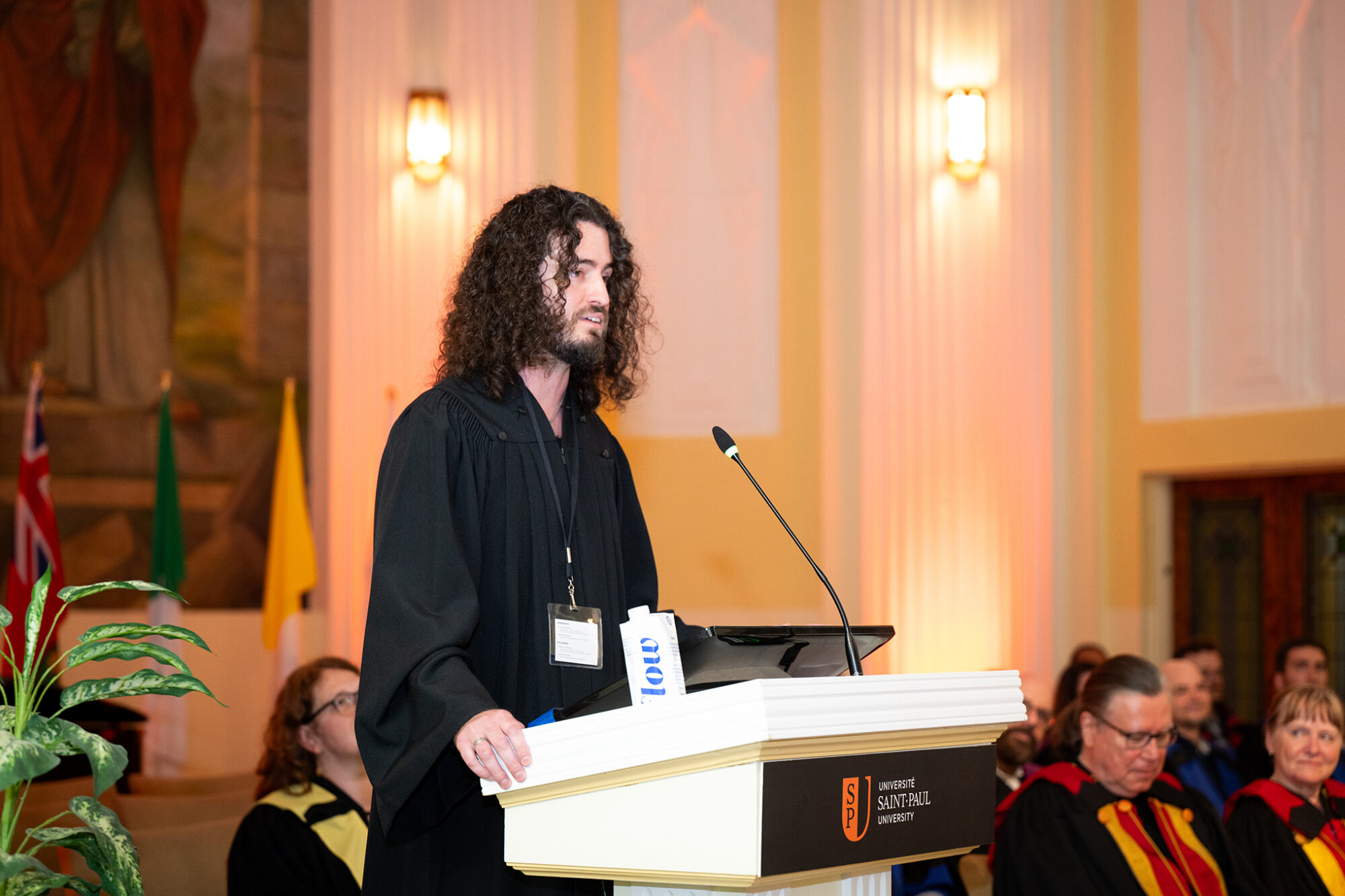 Dr. Nicolas Galton delivers the valedictory address at the afternoon ceremony.